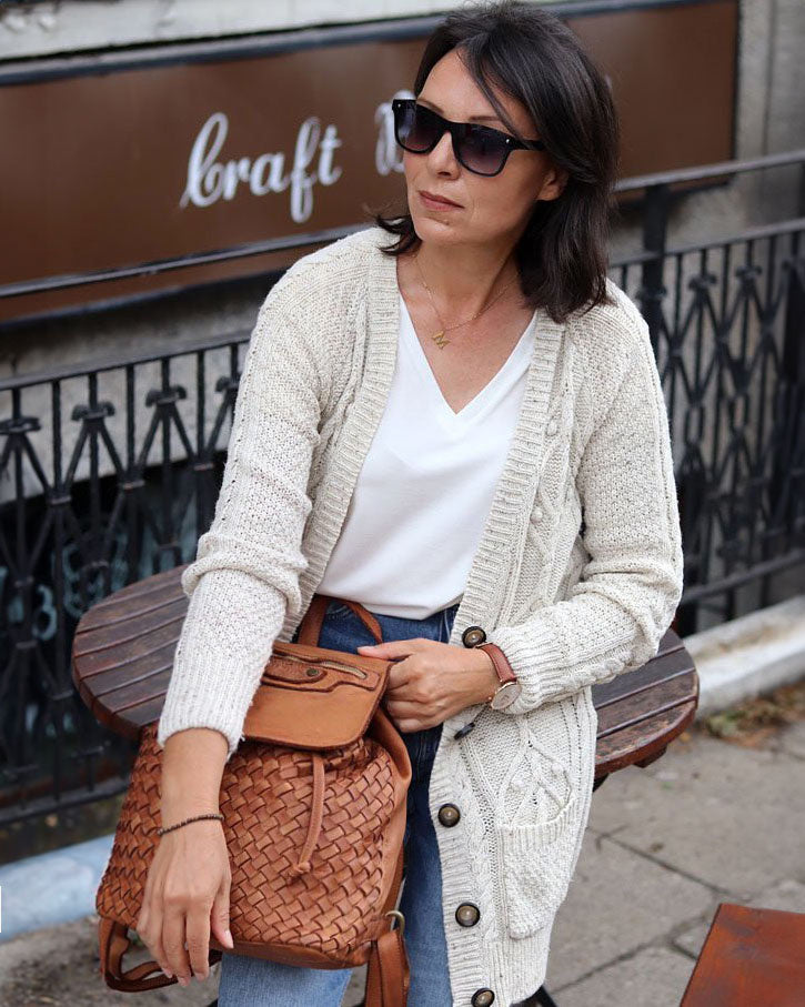 Balos. Liten cityryggsäck för dam i flätat läder